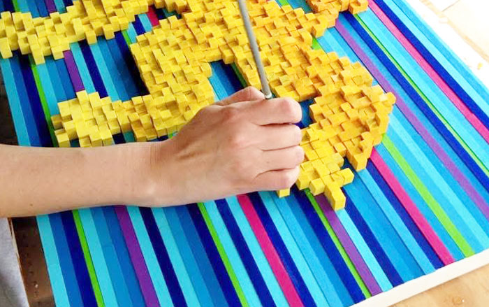 The artist working in her studio.